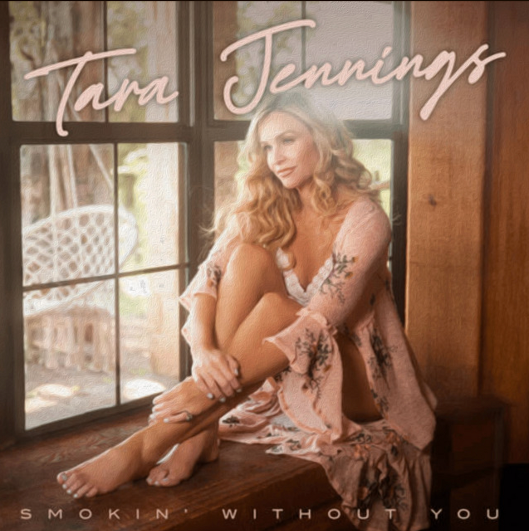 Tara Jennings sitting on a wooden windowsill, looking upward, wearing a pink floral robe with bare feet, next to a large window with natural light. Text reads "Tara Jennings" and "Smokin' Without You" — album cover art.